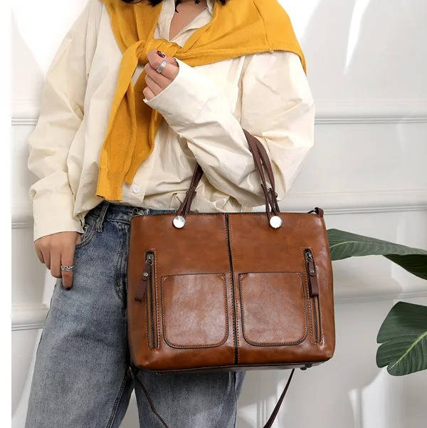 Vintage Style Leather Handbag With Shoulder Strap